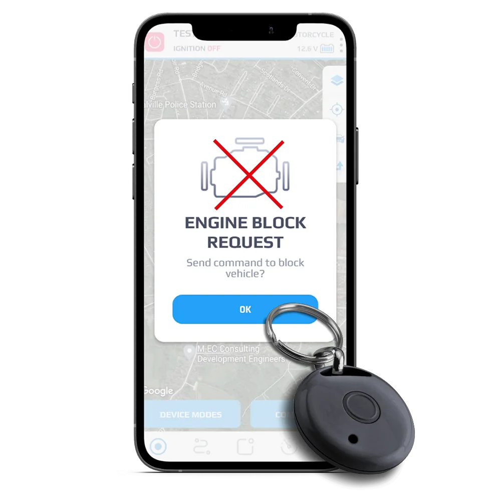 Meta Trak app asking to confirm an engine block request, beside a driver tag