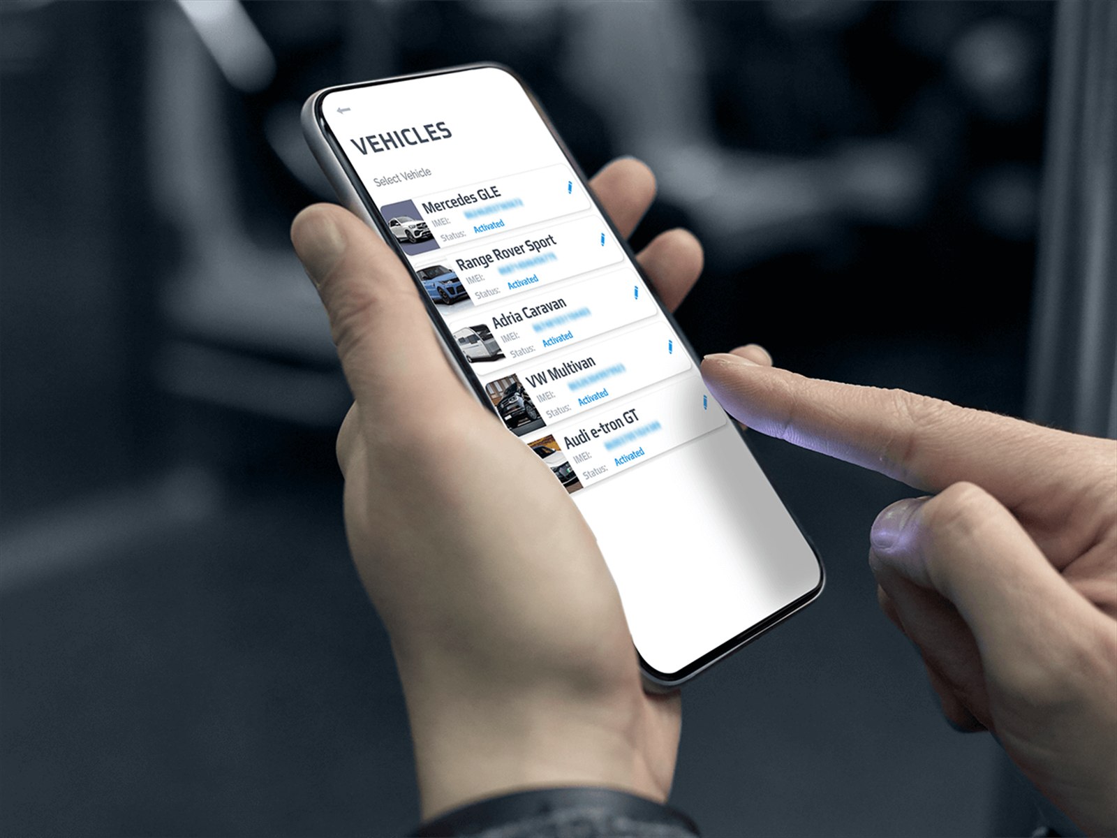 A phone showing vehicles in the Meta Trak app